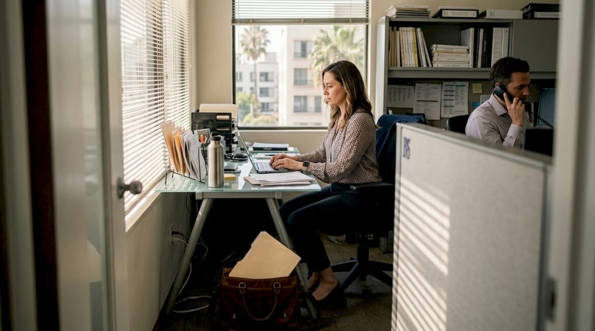 Female agent working at Hollywood office desk